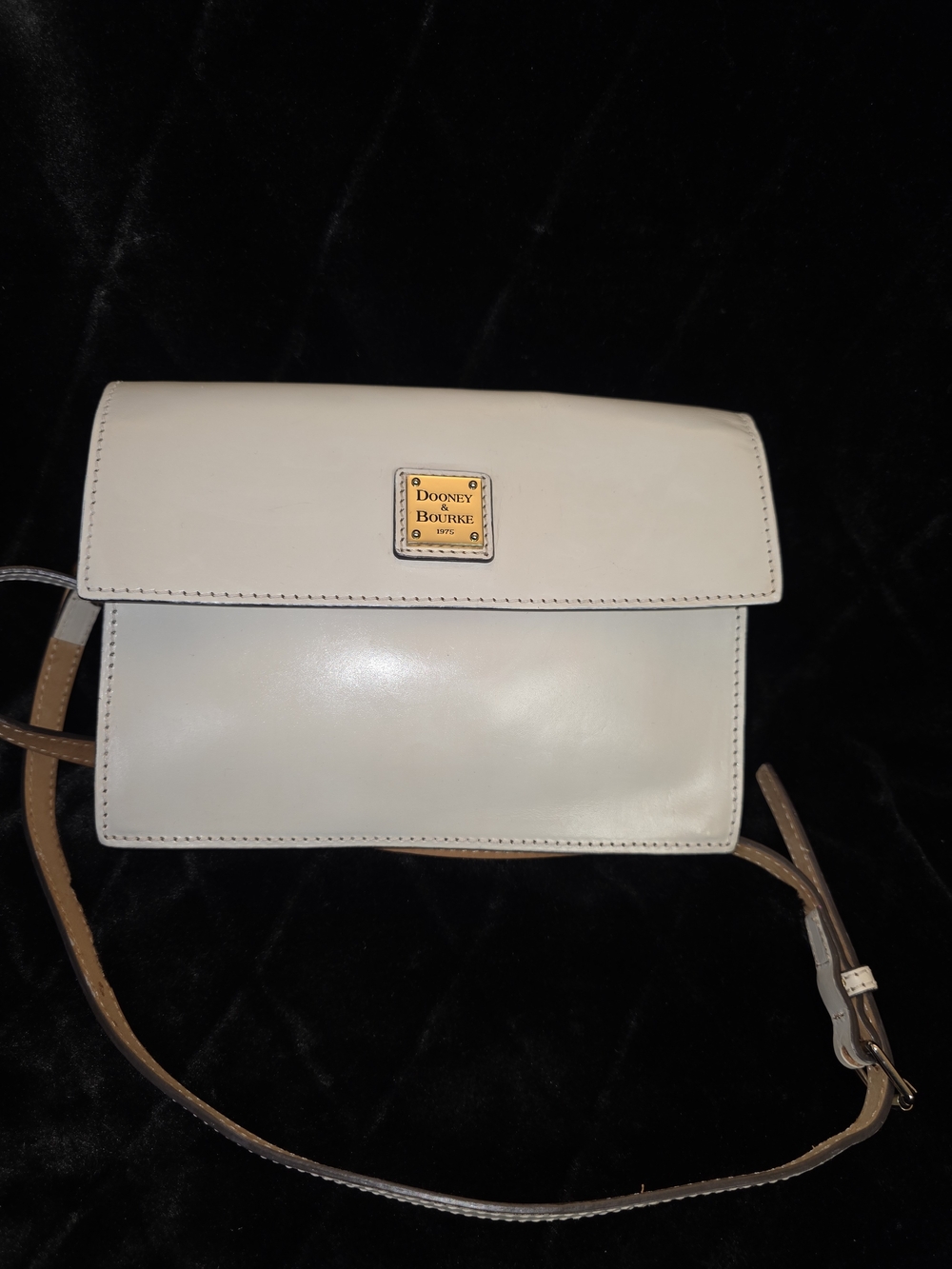 Dooney & Bourke Cream Leather Sling Crossbody with Gold Logo